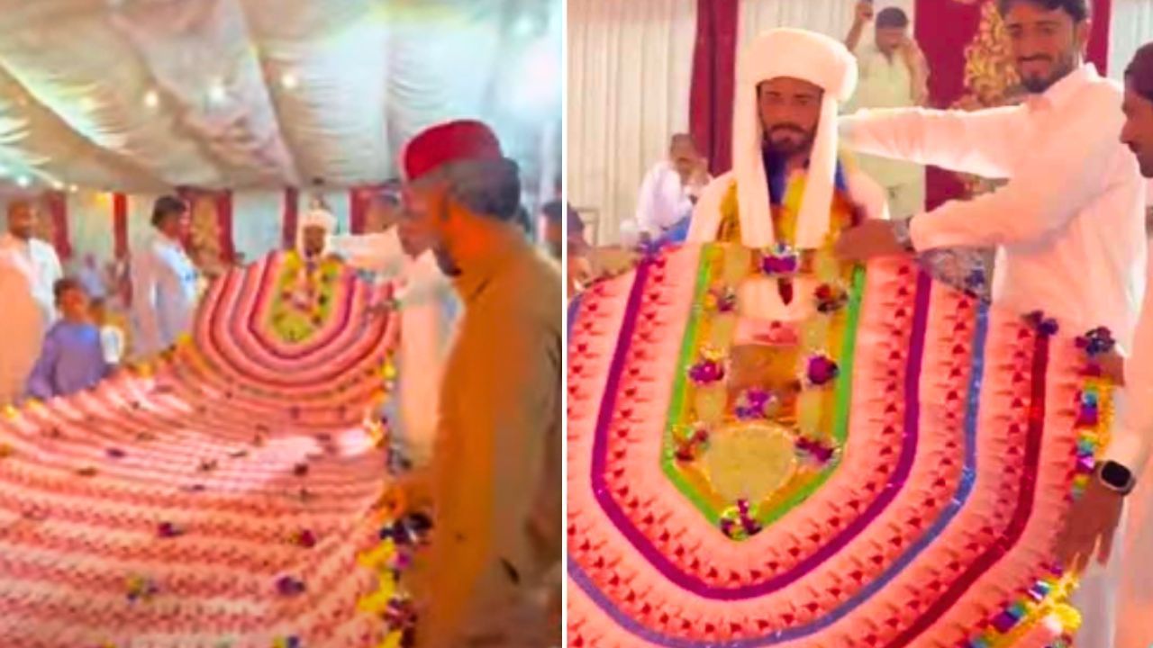 Viral Video: ਪਾਕਿਸਤਾਨੀ ਭਰਾ ਨੇ ਲਾੜੇ ਨੂੰ ਪਹਿਨਾਇਆ 35 ਫੁੱਟ ਲੰਬੀ ਨੋਟਾਂ ਦੀ ਮਾਲਾ, VIDEO ਹੋਈ ਵਾਇਰਲ Viral Video: ਪਾਕਿਸਤਾਨੀ ਭਰਾ ਨੇ ਲਾੜੇ ਨੂੰ ਪਹਿਨਾਇਆ 35 ਫੁੱਟ ਲੰਬੀ ਨੋਟਾਂ ਦੀ ਮਾਲਾ, VIDEO ਹੋਈ ਵਾਇਰਲ