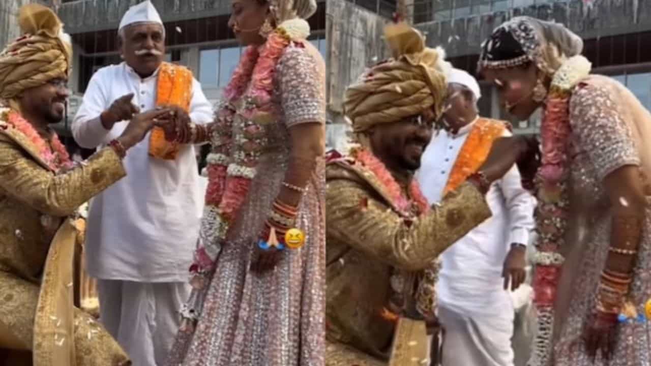 Viral Video: ਲਾੜੀ ਦੇ ਹੱਥ ਤੇ KISS ਕਰ ਰਿਹਾ ਸੀ ਲਾੜਾ, ਪੁਜਾਰੀ ਨੇ ਮਹਿਮਾਨਾਂ ਸਾਹਮਣੇ ਕਰ ਦਿੱਤੀ ਇਹ ਹਰਕਤ Viral Video: ਲਾੜੀ ਦੇ ਹੱਥ ਤੇ KISS ਕਰ ਰਿਹਾ ਸੀ ਲਾੜਾ, ਪੁਜਾਰੀ ਨੇ ਮਹਿਮਾਨਾਂ ਸਾਹਮਣੇ ਕਰ ਦਿੱਤੀ ਇਹ ਹਰਕਤ