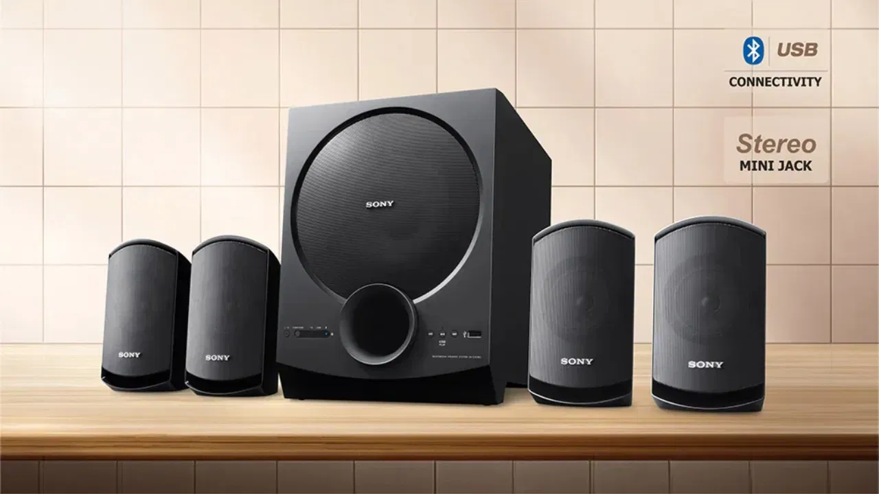 ਸਮਾਰਟ ਹੋਮ ਡਿਵਾਈਸ : Google Nest Mini ਅਤੇ Amazon Echo Dot (4th Gen)ਹੁਣ ਸਿਰਫ਼ ₹3,000 ਤੋਂ  ਘੱਟ ਵਿੱਚ ਮਿਲ ਜਾਣਗੇ । ਵੌਇਸ ਕਮਾਂਡ ਨਾਲ ਮਿਊਜ਼ਿਕ ਚਲਾਓ, ਟਾਈਮਰ ਸੈੱਟ ਕਰੋ ਜਾਂ ਸਮਾਰਟ ਲਾਈਟਸ ਕੰਟਰੋਲ ਕਰੋ।ਇਹਨਾਂ ਦੀ ਵਰਤੋਂ ਸੰਗੀਤ ਚਲਾਉਣ, ਟਾਈਮਰ ਸੈੱਟ ਕਰਨ, ਜਾਂ ਸਮਾਰਟ ਲਾਈਟਾਂ ਅਤੇ ਉਪਕਰਣਾਂ ਨੂੰ ਵੌਇਸ ਕਮਾਂਡਾਂ ਨਾਲ ਕੰਟਰੋਲ ਕਰਨ ਲਈ ਕਰ ਸਕਦੇ ਹੋ।  ਇਸ ਤੋਂ ਇਲਾਵਾ, ₹10,000 ਤੋਂ ਘੱਟ ਵਿੱਚ ਤੁਸੀਂ ਹੋਮ ਥੀਏਟਰ ਵੀ ਖਰੀਦ ਸਕਦੇ ਹੋ — SONY SA-D40M2 4.1ch, JBL Cinema SB241 2.1 ਅਤੇ Portronics Pure Sound 107 200W ਬਹੁੱਤ ਵਧੀਆ ਆਪਸ਼ਨ ਹਨ।(Image-SONY)