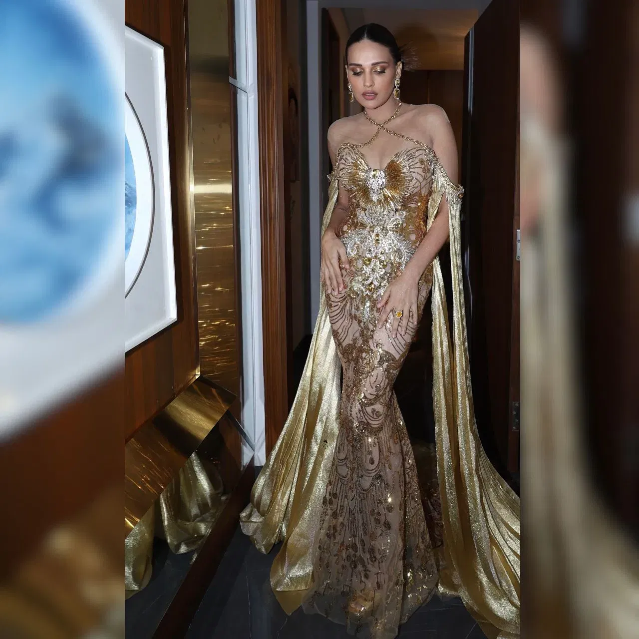 ਹਿਮਾਂਸ਼ੀ ਦਾ ਇਹ ਲੁਕ ਕਾਫ਼ੀ ਗਲੈਮਰਸ ਹੈ, ਉਨ੍ਹਾਂ ਨੇ ਇੱਕ ਗੋਲਡਨ ਫਿਸ਼-ਕਟ ਗਾਊਨ ਪਾਇਆ ਹੋਇਆ ਹੈ ਜੋ ਆਫ ਸ਼ੋਲਡਰ ਹੈ। ਗਾਊਨ ਵਿੱਚ ਇੱਕ 3D ਪੈਟਰਨ ਦਿੱਤਾ ਗਿਆ ਹੈ, ਜੋ ਇਸਨੂੰ ਯੂਨੀਕ ਬਣਾਉਂਦਾ ਹੈ। ਗੋਲਡਨ ਆਈਸ਼ੈਡੋ ਅਤੇ ਸਲੀਕ ਬੰਨ ਦੇ ਨਾਲ, ਹਿਮਾਂਸ਼ੀ ਸਟਨਿੰਗ ਲੱਗ ਰਹੀ ਹੈ।