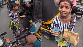 ਟ੍ਰੈਫਿਕ ਸਿਗਨਲ 'ਤੇ ਬੰਦੇ ਨੇ ਬੱਚੀ ਨਾਲ ਦਿਖਾਈ ਇਨਸਾਨੀਅਤ, VIDEO ਨੇ ਕੀਤਾ ਖੁਸ਼