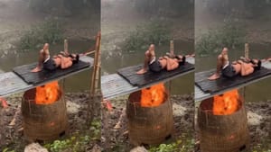 ਠੰਡ ਤੋਂ ਬਚਣ ਲਈ ਅੱਗ 'ਤੇ ਲੇਟ ਗਿਆ ਬੰਦਾ, ਲੋਕ ਬੋਲੇ: Likes ਤੇ Views ਦੀ ਭੁੱਖ