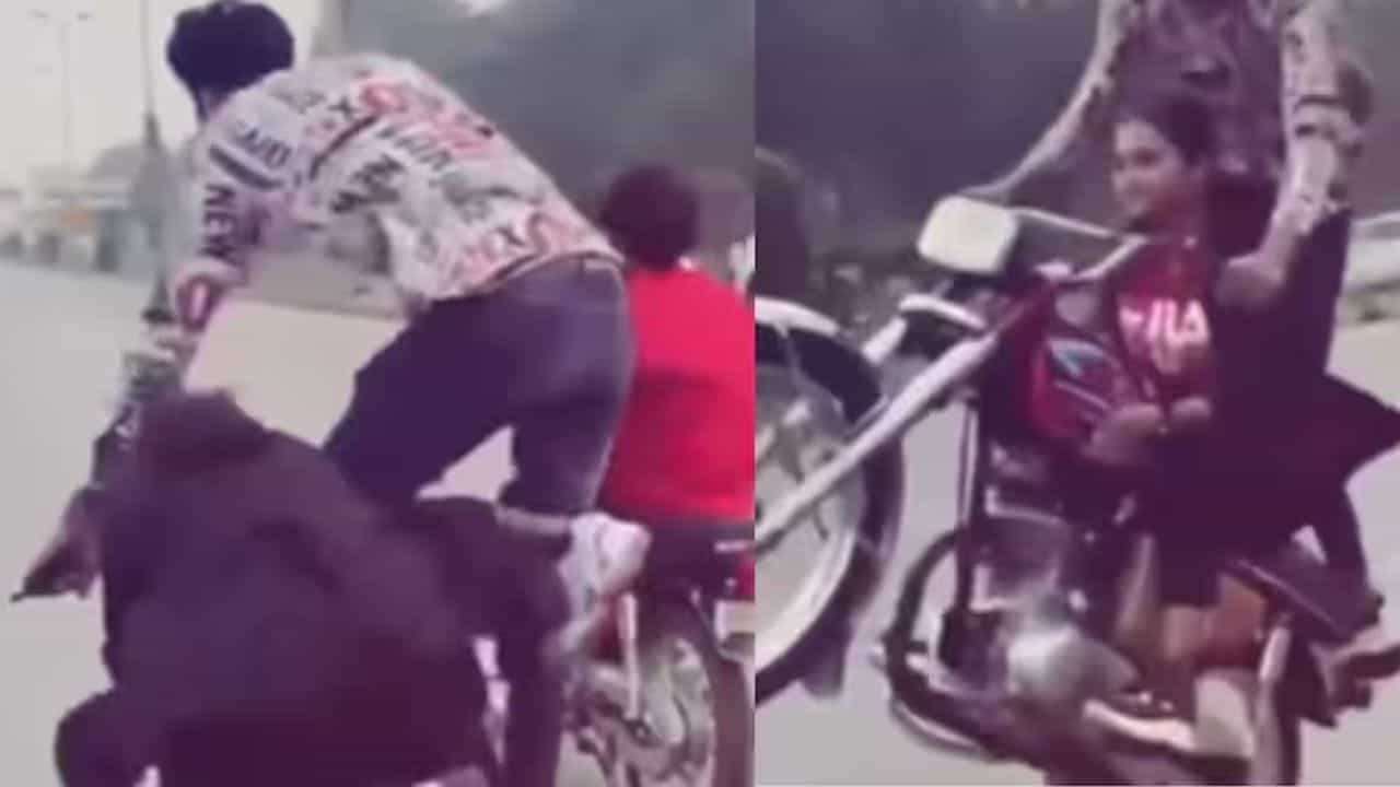 Viral Video: ਮੁੰਡੇ ਨੇ ਸਹੇਲੀ ਦੇ ਪਿੱਛੇ ਖੜੇ ਹੋ ਕੇ ਇੱਕ ਪਹੀਏ ਤੇ ਚਲਾਈ ਬਾਈਕ, ਸਟੰਟ ਦੇਖ ਹੈਰਾਨ ਰਹਿ ਗਏ ਲੋਕ